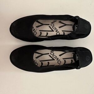 Fly London black suede low wedge heels.